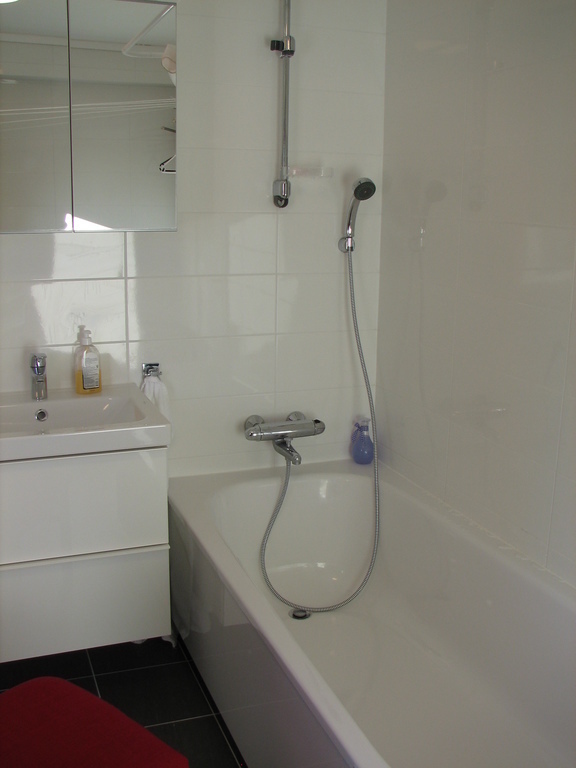 Bathroom upstairs has a big bath tub (180 cm x 80 cm) and heated floor