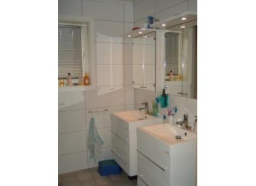 Bathroom with shower and bathtub.