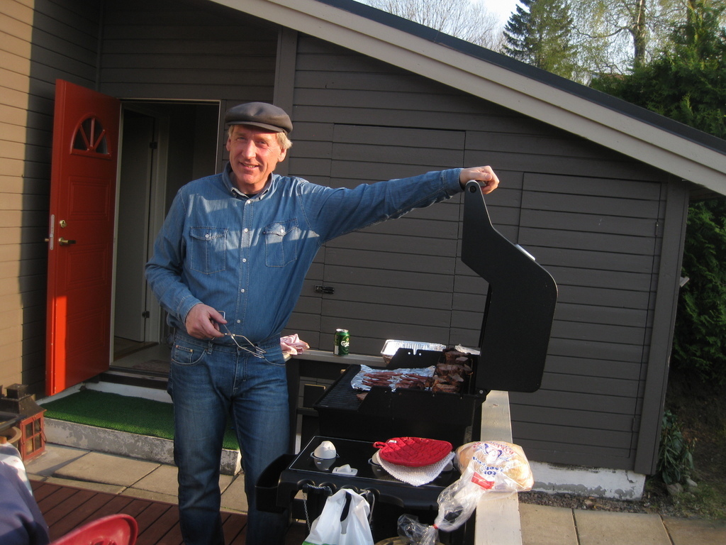 Terrace in front of the house with afternoon sun.