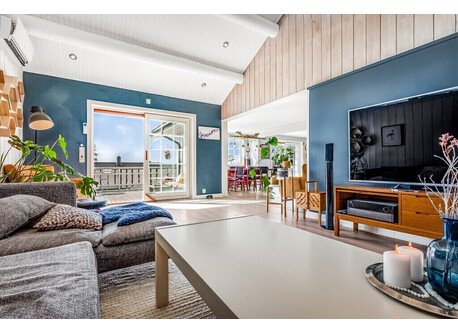 The tv-room with entrance to balcony