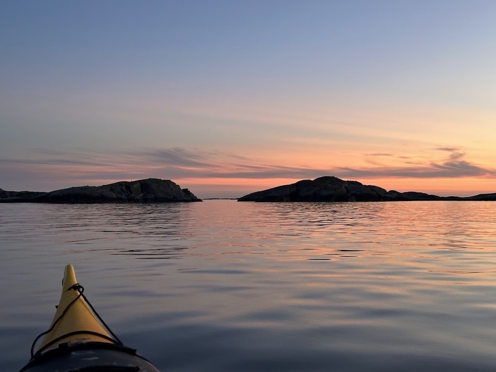 Kayakking by the coast. 