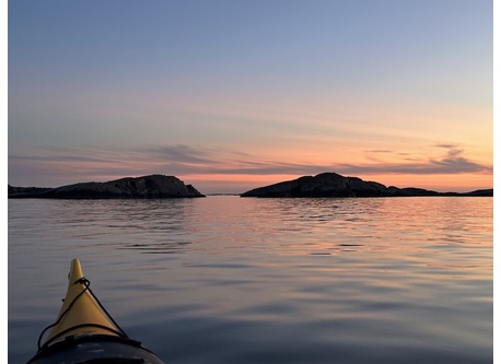 Kayakking by the coast. 