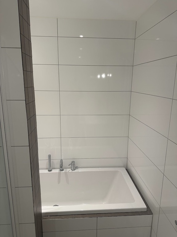 Bathroom ground floor with shower and bathtub