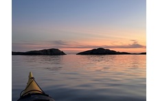 Kayakking by the coast. 