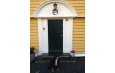 My flat is on the first floor of this 2 store house, with garden all the way around. (the dog is no longer alive)