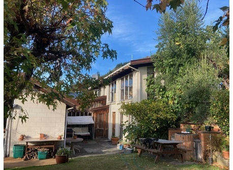 The house is in a quiet suburban area with lovely views and a private garden.