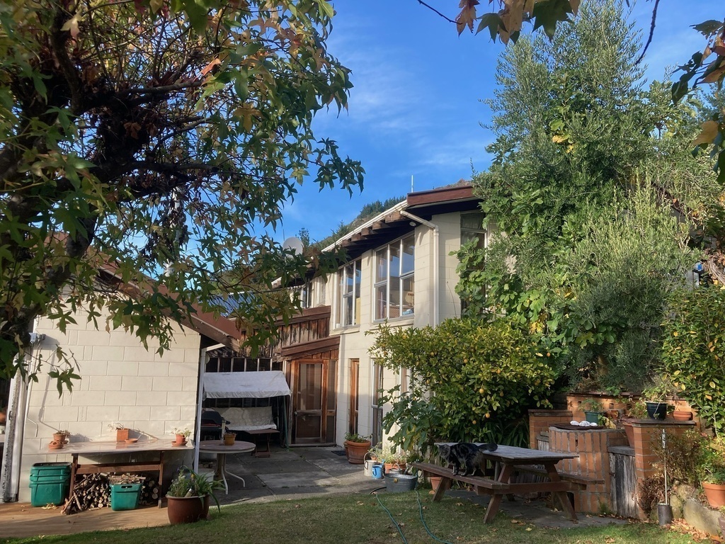 The house is in a quiet suburban area with lovely views and a private garden. 