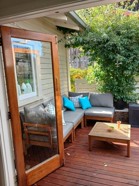 Back Porch off Kitchen Good to morning coffee and sun.