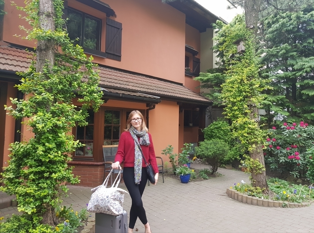 Ania in front of our house 