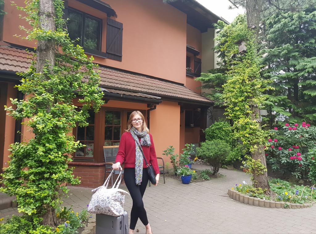 Ania in front of our house 