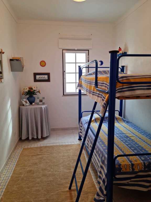 small bedroom with bunk beds