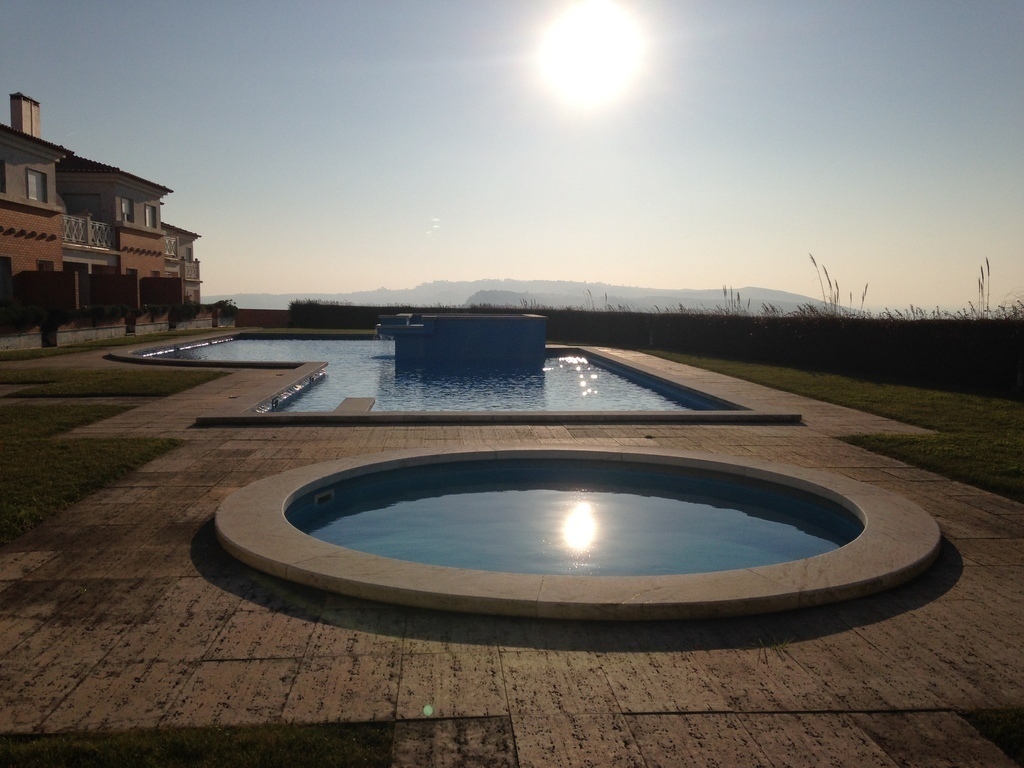 The swimming pool of the condominium.