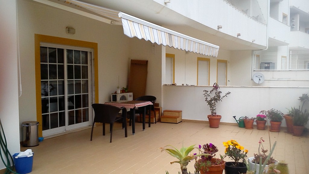 our terrace with awning and some plants 