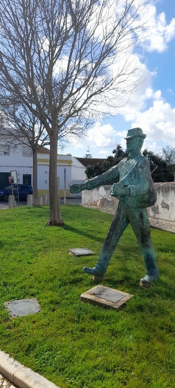 statue to the village farmer's