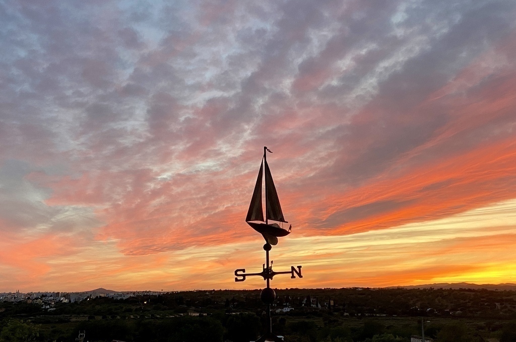 Summer sunsets are spectacular from our rooftop terrace.