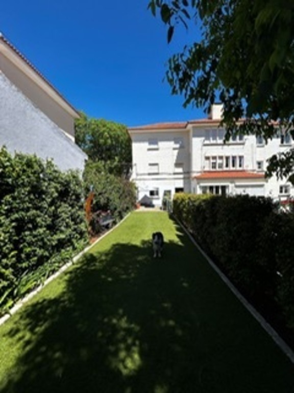 View from top of garden looking at apartment