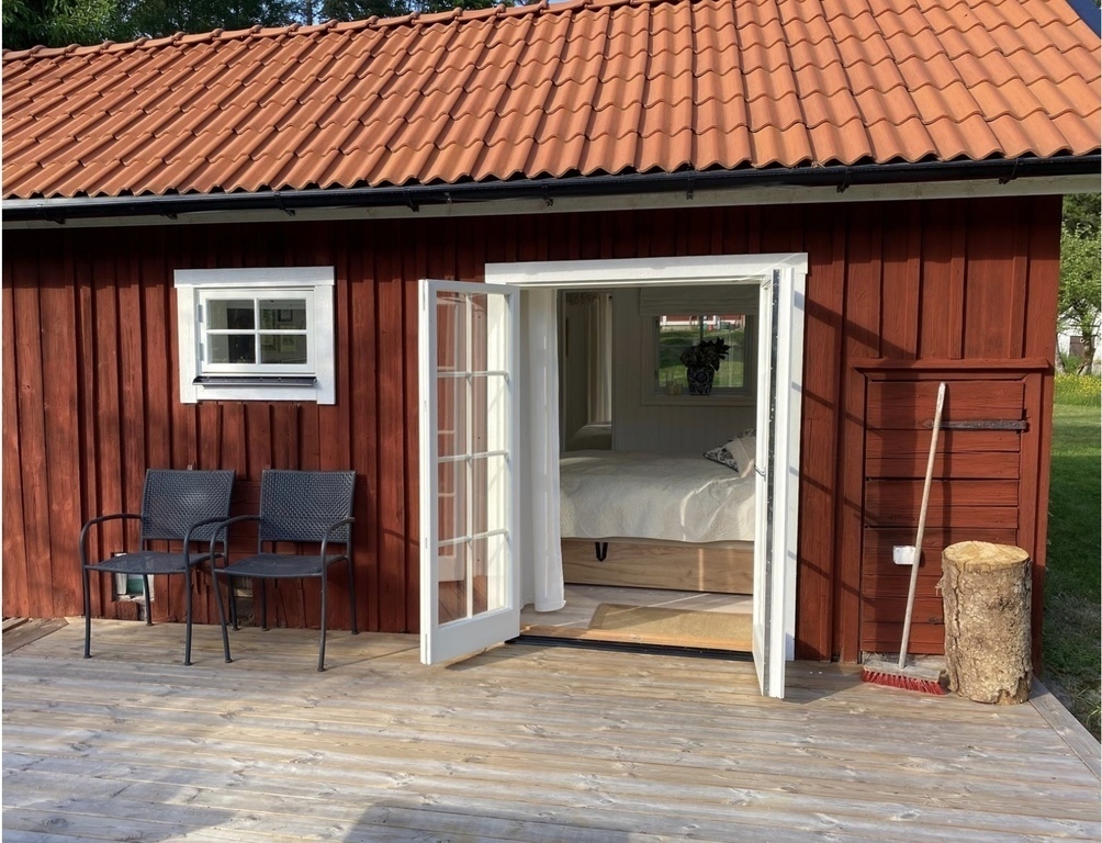 Back porch of chicken house/guest room 