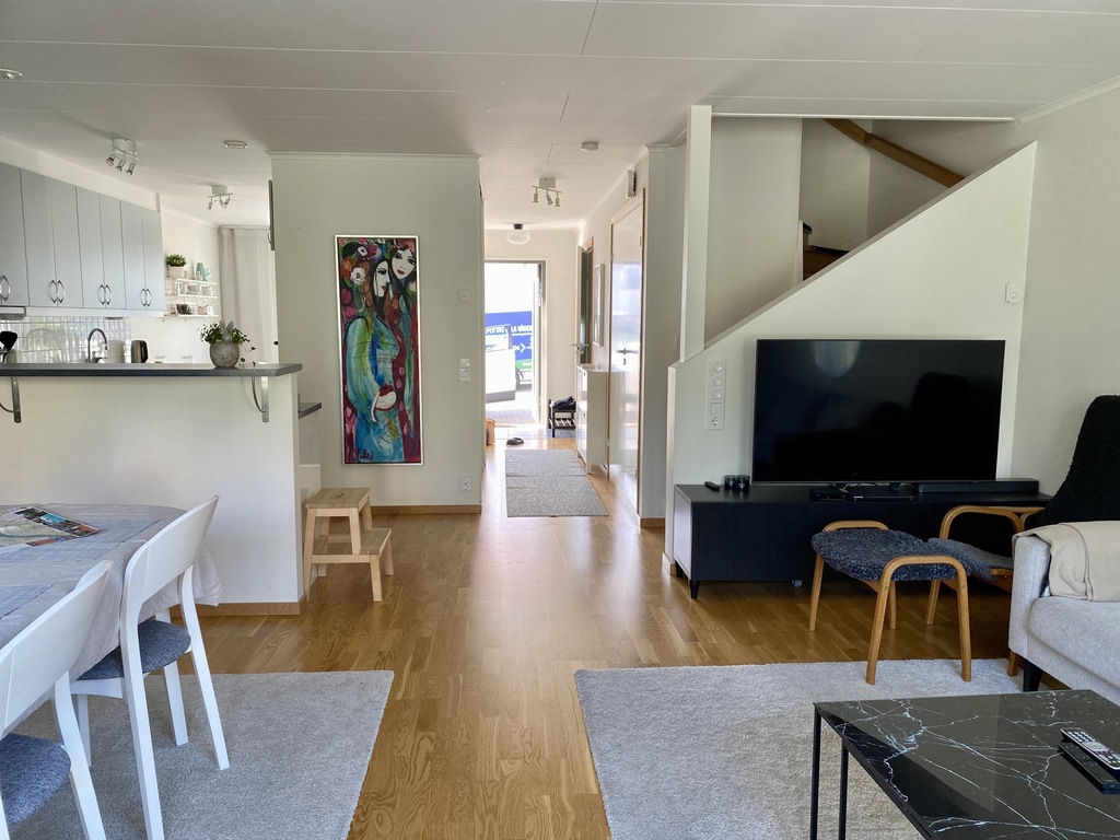 Living room towards kitchen and entrance