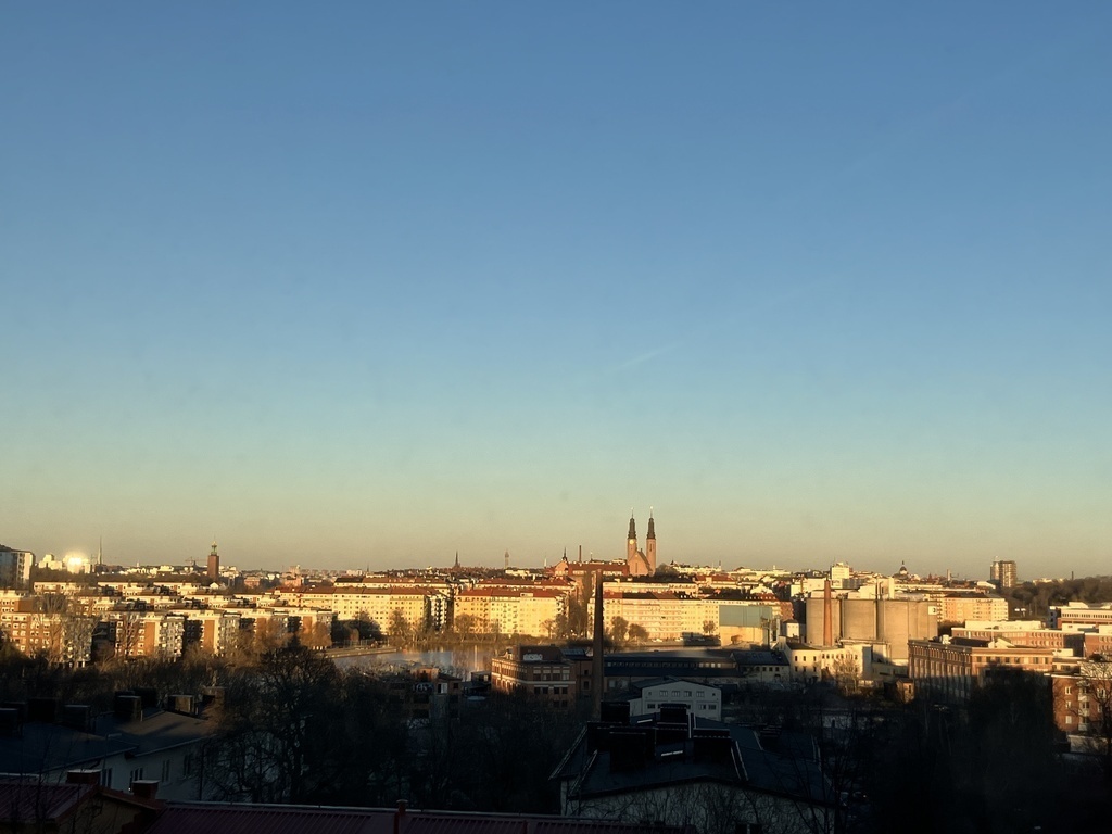 Balcony view - the center of Stockholm, from north to south, with the town hall, the globe, churches, lake Mälaren….