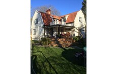 House and sunny garden all day long