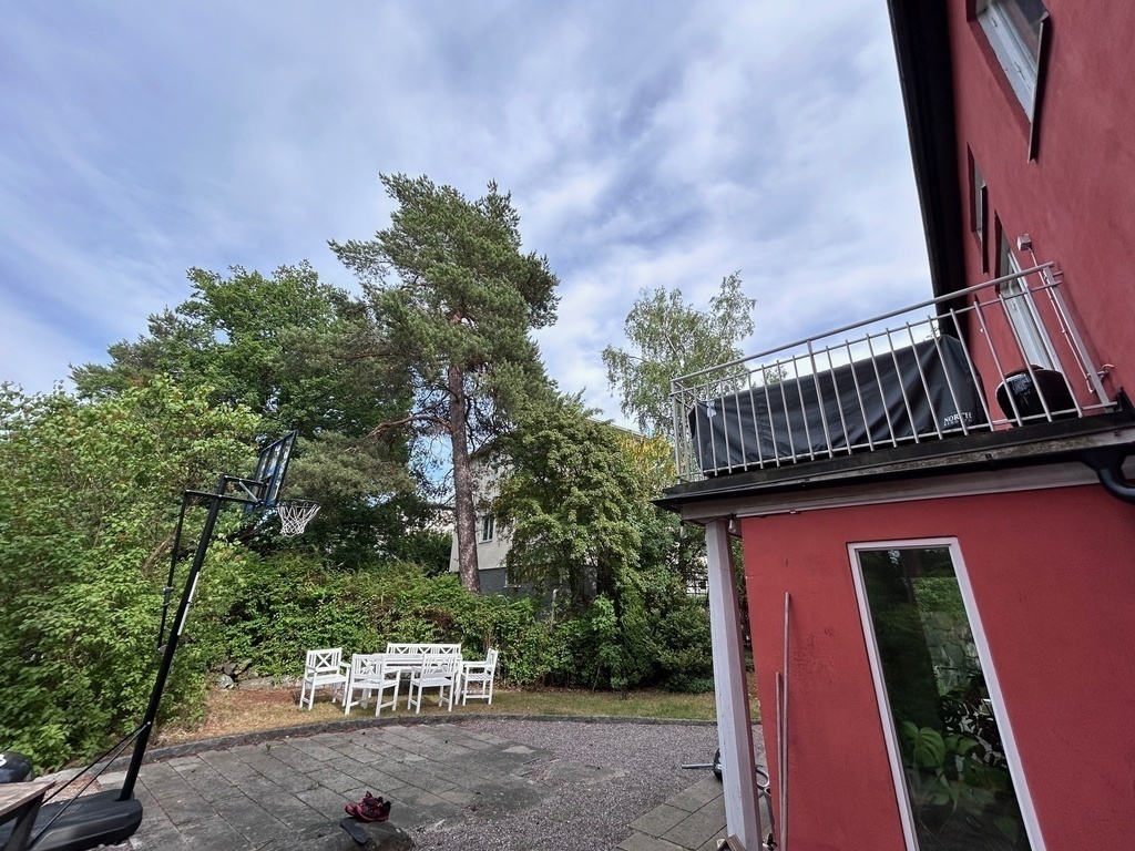 Outside: Basketball and dining table on back side