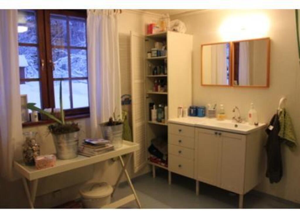 Bathroom with a bath tub downstairs