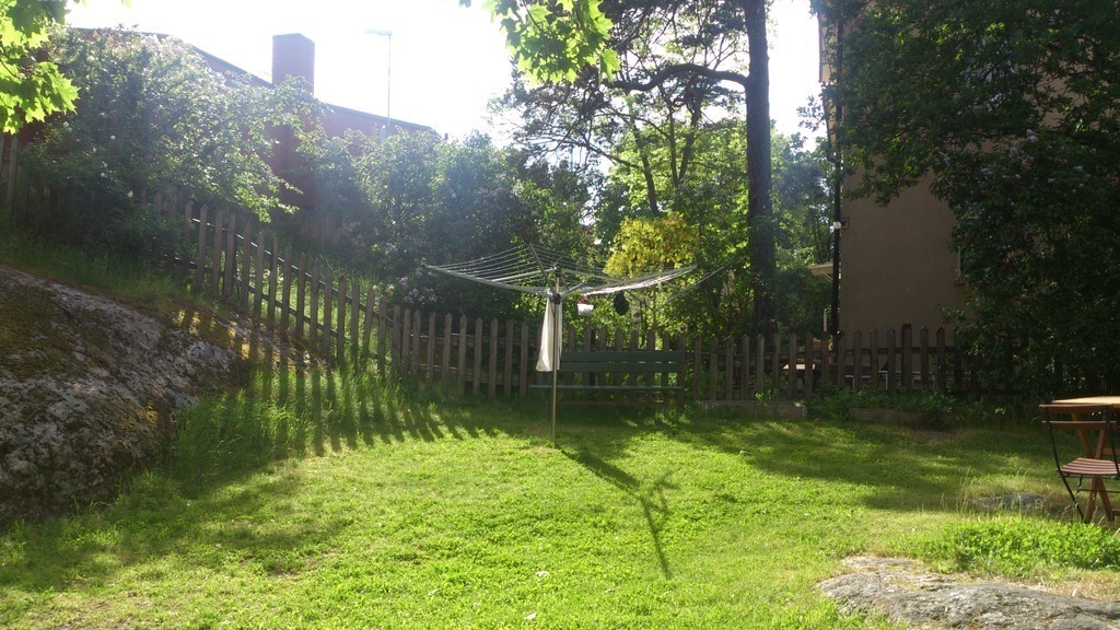 The lawn to relax on. Laundry hanger outside in the garden and a small inside the bathroom. 