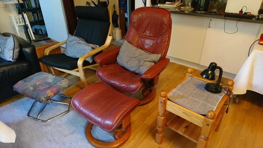 Livingroom with 2 armchairs to relax in, and put your feets high after a long walk around Stockholm!