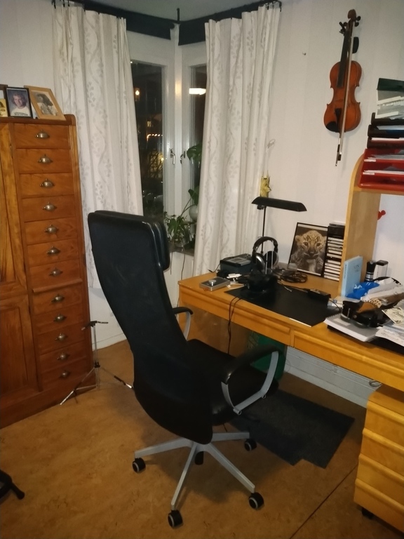 The chair and desk in one of the bedroom.