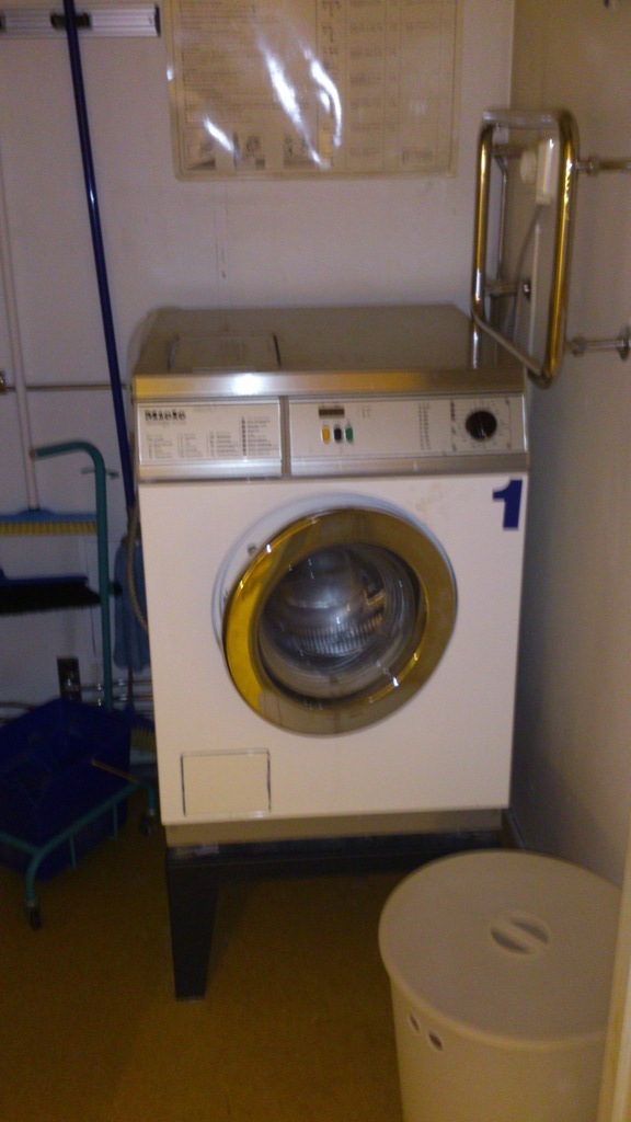 Washing machine downstairs on the first floor for 9 appartements and a dryer in the next room.