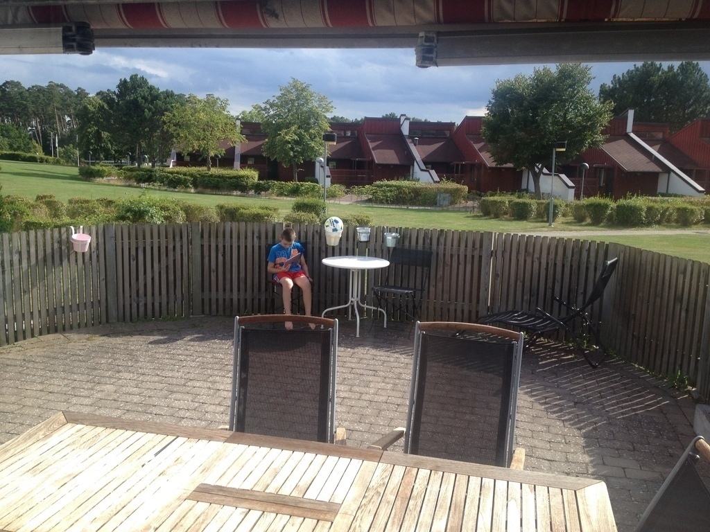 The patio at the back is sunlit throughout the day and evening