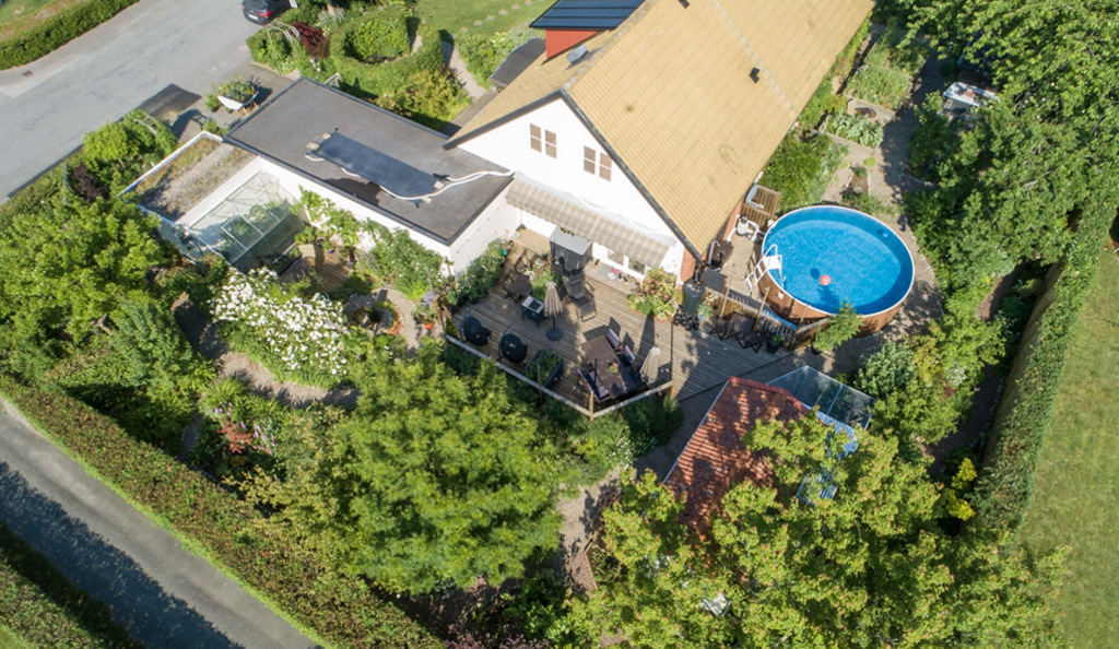 The patio outside the kitchen and pool area.