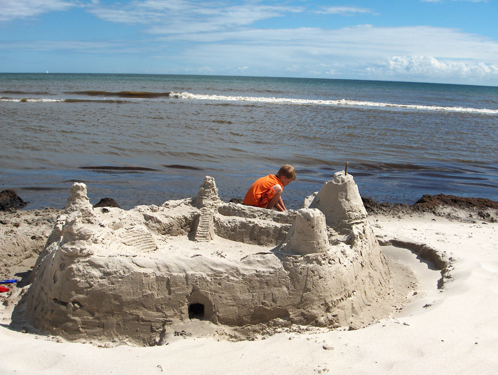 The beach by the sea.