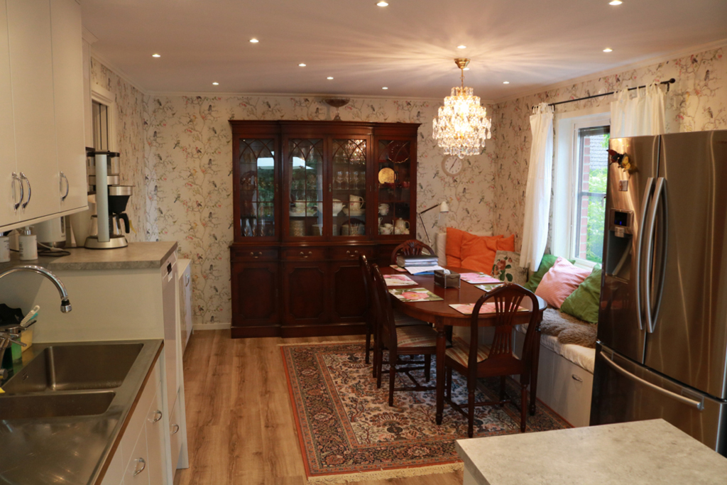 The kitchen: the hub of the house with a long sofa for relaxing/reading.