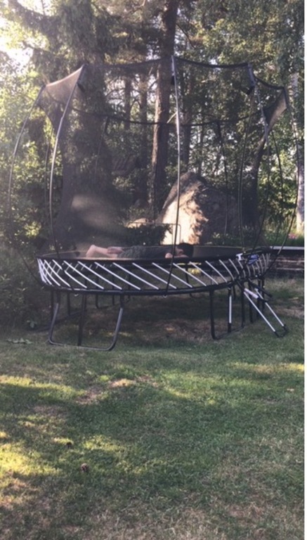 Trampoline in garden 