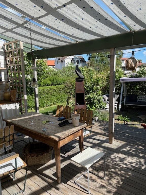 Terass with bbq and dinnertable