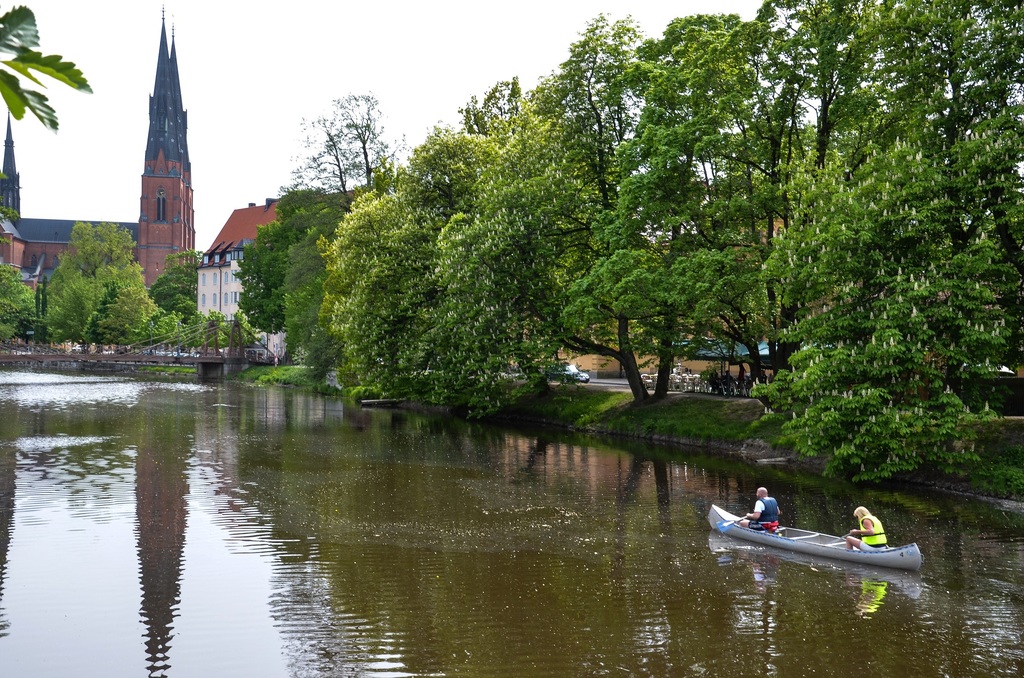 The river "Fyrisån" runs through the city. The Cathedral in the background