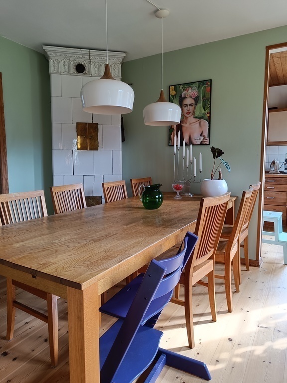 Dinner table with lots of space for family and friends.