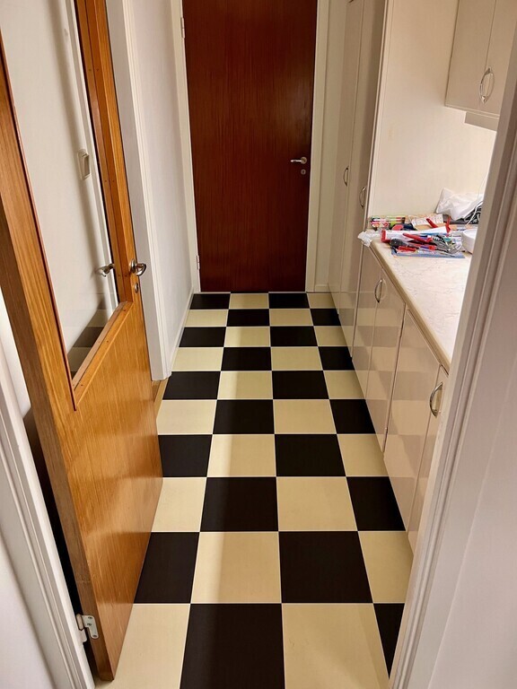 Small hall between living room and separate kitchen area