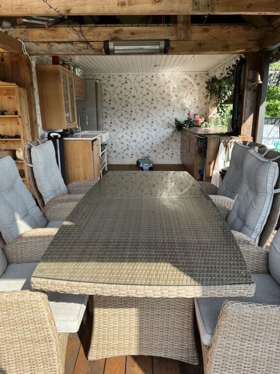 Outdoor dining table with 6 comfortable chairs 