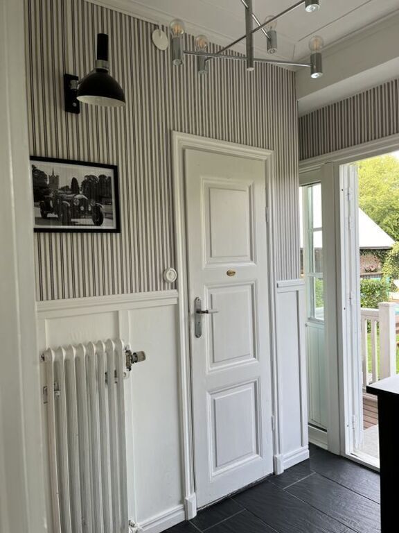 entrance to the garden and a small toilet 