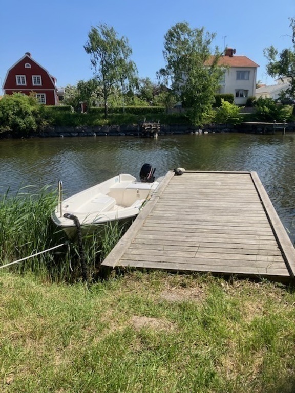 Our boat (4,65 m with a 15 hp Mercury) and jetty, 400 m from the house