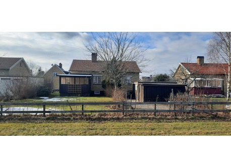Garden in the early spring. Photo taken before the pergola was built. 