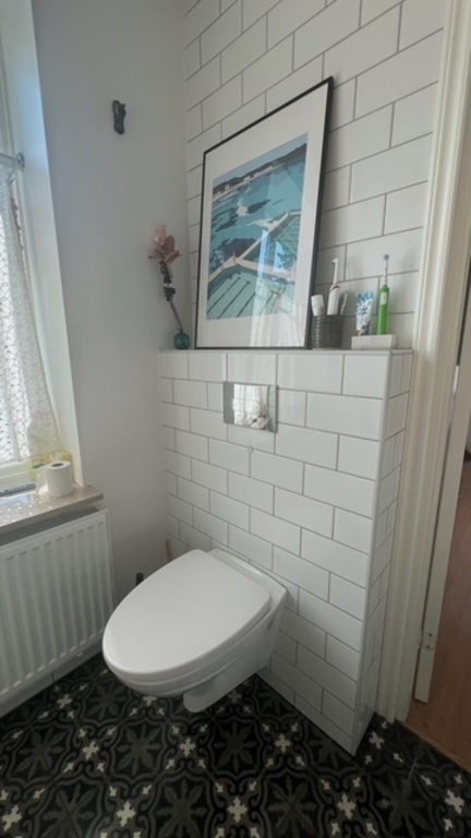 Two modern bathrooms with everything a family needs. One on each floor. 