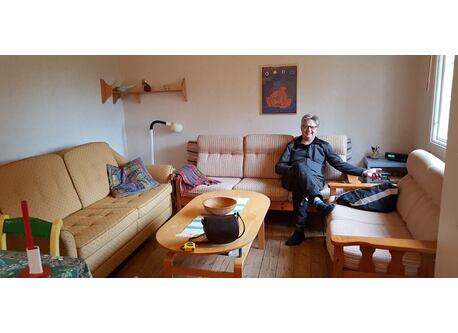 The living room-part of the big house. The yellow sofa is also a twin bed.