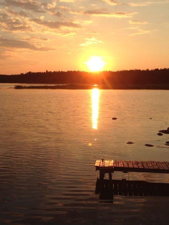 Sunset summer cottage from our private beach.