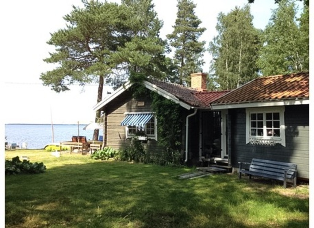 Summer cottage with our private beach in front of the house.
