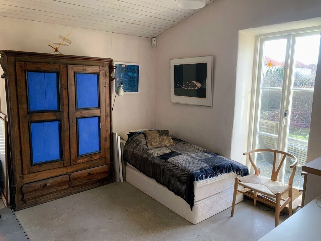 single bed in the office downstairs