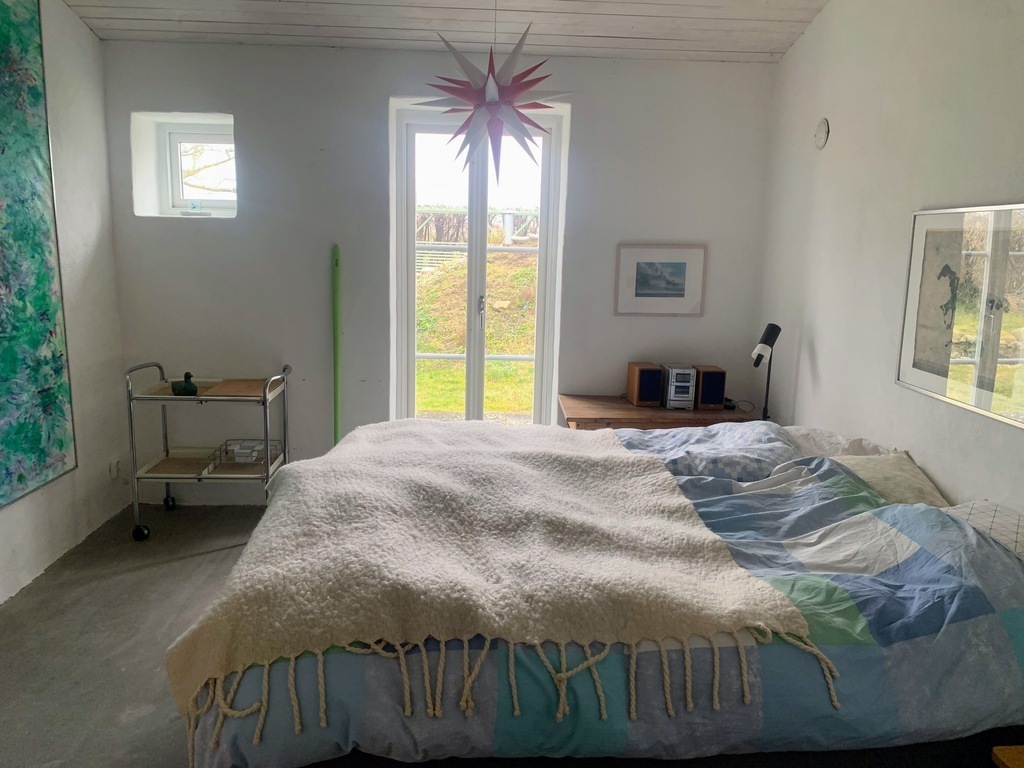 Bed room downstairs with a double bed