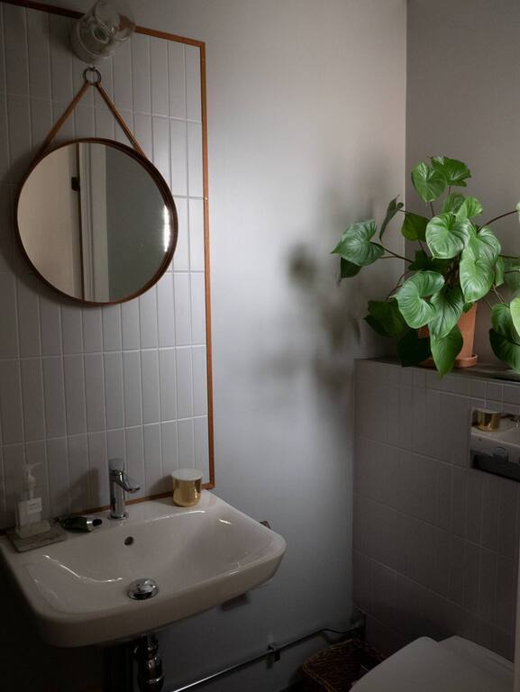 Smaller bathroom with toilet.